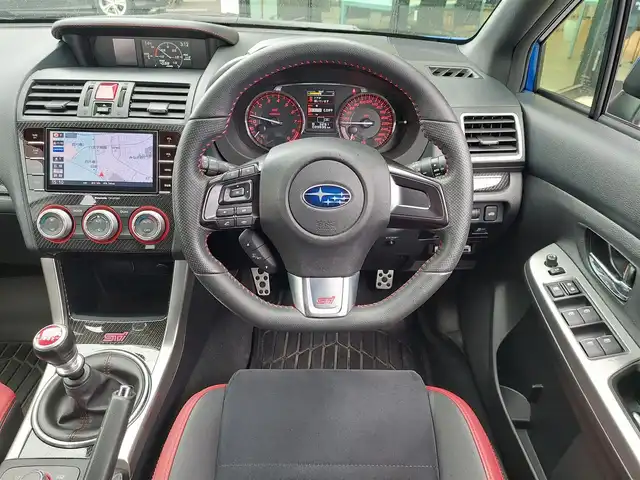 スバル ＷＲＸ ＳＴＩ STI 東京都 2016(平28)年 4万km WRブルーパール 純正ナビ/フルセグ/バックカメラ/ビルトインETC/ドライブレコーダー/ハーフレザーシート/コーナーセンサー/純正18インチAW/リヤスポイラー/スマートキー/オートライト/フォグ