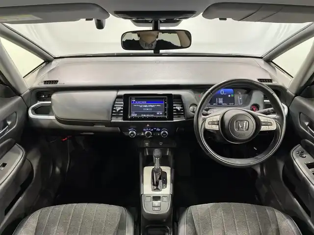 ホンダ フィット e:HEVホーム 愛知県 2020(令2)年 4.1万km クリスタルブラックパール 純正ナビ/衝突軽減ブレーキ/レーダークルーズコントロール/バックカメラ/前後ドライブレコーダー/ハーフレザーシート/ＬＥＤヘッドライト/コーナーセンサー/踏み間違い防止システム/純正フロアマット/電動パーキングブレーキ