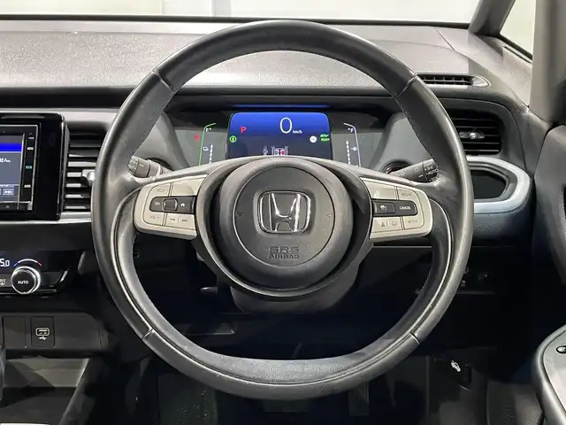 ホンダ フィット e:HEVホーム 愛知県 2020(令2)年 4.1万km クリスタルブラックパール 純正ナビ/衝突軽減ブレーキ/レーダークルーズコントロール/バックカメラ/前後ドライブレコーダー/ハーフレザーシート/ＬＥＤヘッドライト/コーナーセンサー/踏み間違い防止システム/純正フロアマット/電動パーキングブレーキ