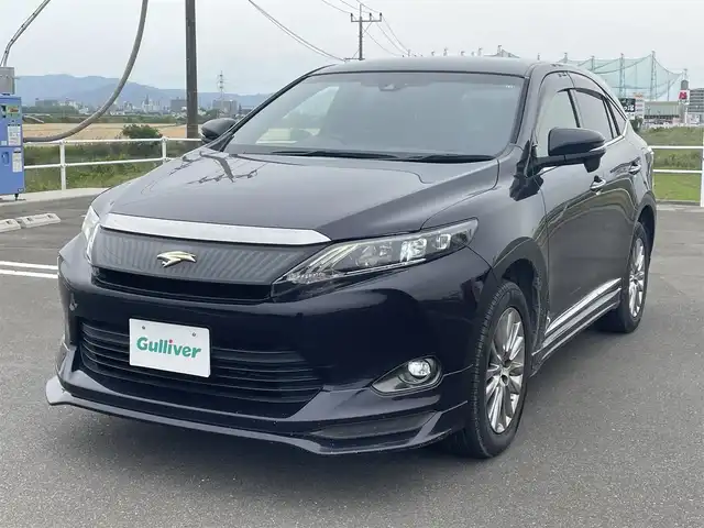 トヨタ ハリアー プレミアム 佐賀県 2015(平27)年 5.7万km スパークリングブラックパールクリスタルシャイン アルパイン9型ナビ/・フルセグTV/CD/DVD/SD/Bluetooth/バックカメラ/パワーバックドア/純正エアロ/クルーズコントロール/レーンディパーチャーアラート/横滑り防止機能/ハーフレザーシート/D席メモリーシート/ISOFIX対応/革巻きステアリング/ステアリングリモコン/LEDヘッドライト/LEDフォグライト/オートマチックハイビーム/ウィンカーミラー/プッシュスタート/スマートキー/ETC/純正18インチアルミホイール/純正フロアマット/純正ドアバイザ―/保証書・取扱説明書/スペアキー1本