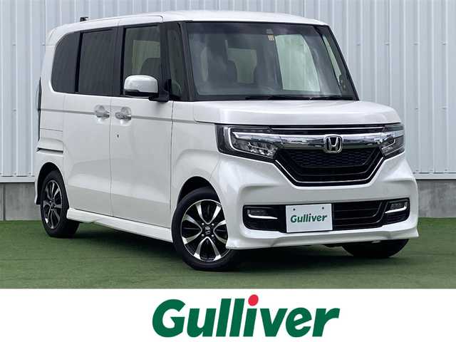 ホンダ Ｎ ＢＯＸ カスタム G L ホンダセンシング 香川県 2018(平30)年 5.4万km プラチナホワイトパール 登録時走行距離：54079km/ディーラー純正8型ナビ/バックカメラ/左側パワースライドドア/衝突被害軽減装置/レーンキープアシスト/レーダークルーズコントロール/横滑り防止装置/LEDヘッドライト/オートライト/フォグランプ/ビルトインETC/ロールサンシェード/ISOFIX/ステアリングスイッチ/プッシュスタート/スマートキー