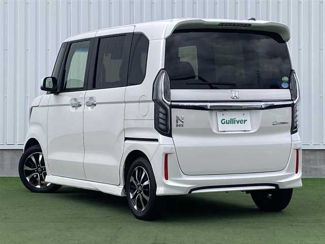 ホンダ Ｎ ＢＯＸ カスタム G L ホンダセンシング 香川県 2018(平30)年 5.4万km プラチナホワイトパール 登録時走行距離：54079km/ディーラー純正8型ナビ/バックカメラ/左側パワースライドドア/衝突被害軽減装置/レーンキープアシスト/レーダークルーズコントロール/横滑り防止装置/LEDヘッドライト/オートライト/フォグランプ/ビルトインETC/ロールサンシェード/ISOFIX/ステアリングスイッチ/プッシュスタート/スマートキー