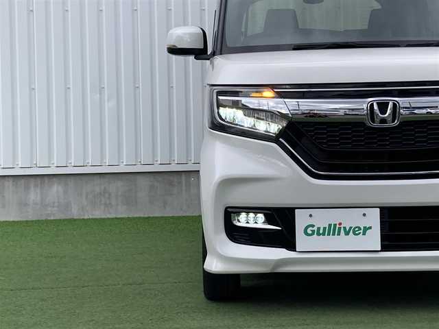 ホンダ Ｎ ＢＯＸ カスタム G L ホンダセンシング 香川県 2018(平30)年 5.4万km プラチナホワイトパール 登録時走行距離：54079km/ディーラー純正8型ナビ/バックカメラ/左側パワースライドドア/衝突被害軽減装置/レーンキープアシスト/レーダークルーズコントロール/横滑り防止装置/LEDヘッドライト/オートライト/フォグランプ/ビルトインETC/ロールサンシェード/ISOFIX/ステアリングスイッチ/プッシュスタート/スマートキー