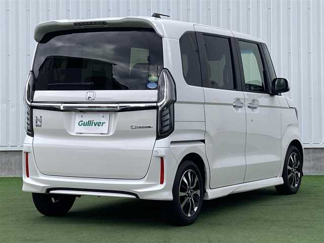 ホンダ Ｎ ＢＯＸ カスタム G L ホンダセンシング 香川県 2018(平30)年 5.4万km プラチナホワイトパール 登録時走行距離：54079km/ディーラー純正8型ナビ/バックカメラ/左側パワースライドドア/衝突被害軽減装置/レーンキープアシスト/レーダークルーズコントロール/横滑り防止装置/LEDヘッドライト/オートライト/フォグランプ/ビルトインETC/ロールサンシェード/ISOFIX/ステアリングスイッチ/プッシュスタート/スマートキー