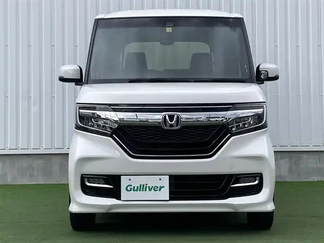 ホンダ Ｎ ＢＯＸ カスタム G L ホンダセンシング 香川県 2018(平30)年 5.4万km プラチナホワイトパール 登録時走行距離：54079km/ディーラー純正8型ナビ/バックカメラ/左側パワースライドドア/衝突被害軽減装置/レーンキープアシスト/レーダークルーズコントロール/横滑り防止装置/LEDヘッドライト/オートライト/フォグランプ/ビルトインETC/ロールサンシェード/ISOFIX/ステアリングスイッチ/プッシュスタート/スマートキー