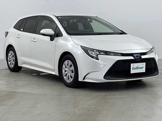 トヨタ カローラツーリング ハイブリッド G－X プラス 道央・札幌 2021(令3)年 5.2万km ホワイトパールクリスタルシャイン ・4WD/・純正ナビ&BT&USB/・トヨタセーフティセンス/・プリクラッシュセーフティ/・ロードサインアシスト/・レーンディパーチャーアラート/・レーダークルーズコントロール/・クリアランスソナー/・ブラインドスポットモニター/・オートホールドブレーキ/・社外ドライブレコーダー/・純正フロアマット/・AC100V/・オートマチックハイビーム/・オートライト/・LEDヘッドライト/・ヘッドライトレベライザー/・ステアリングスイッチ/・ビルトインETC/・横滑り防止/・スマートキー/・プッシュスタート/・電格ミラー