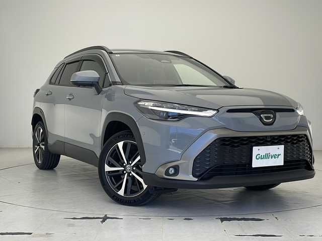 トヨタ カローラ クロス ハイブリッド Z 沖縄県 2024(令6)年 0.4万km セメントグレーメタリック 県外仕入れ車両/純正ナビ　/ディスプレイオーディオ　/フルセグ　/Ｂｌｕｅｔｏｏｔｈ　/パノラミックビューモニター　/ＥＴＣ２．０　/ハーフレザー　/シートヒーター　/置くだけ充電　/パワーシート　/横滑り防止装置　/レーンキープアシスト/クルーズコントロール