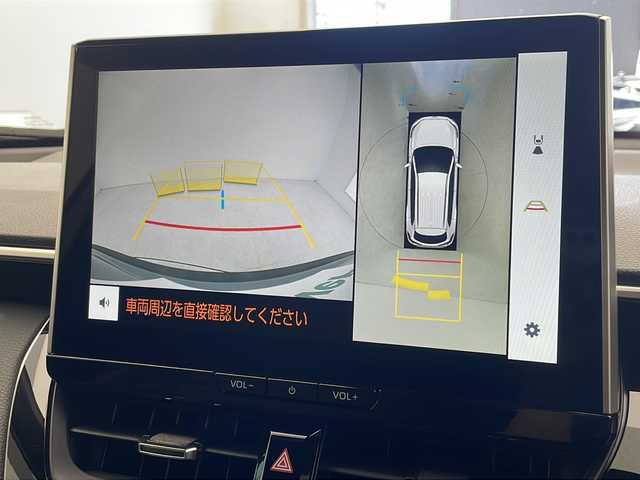 トヨタ カローラ クロス ハイブリッド Z 沖縄県 2024(令6)年 0.4万km セメントグレーメタリック 県外仕入れ車両/純正ナビ　/ディスプレイオーディオ　/フルセグ　/Ｂｌｕｅｔｏｏｔｈ　/パノラミックビューモニター　/ＥＴＣ２．０　/ハーフレザー　/シートヒーター　/置くだけ充電　/パワーシート　/横滑り防止装置　/レーンキープアシスト/クルーズコントロール