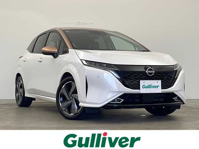 日産 オーラ G FOUR レザーエディション 秋田県 2024(令6)年 0.4万km 白／ゴールド ４ＷＤ/純正メモリナビ/ (フルセグＴＶ/Bluetooth/HDMI/AndroidAuto)/全方位カメラ/プロパイロット/ステアリングヒーター/ＢＯＳＥサウンドシステム/デジタルインナーミラー/ワイヤレス充電/前席シートヒーター/オートブレーキホールド/オートライト/スマートキー/スペアキー/社外フロアマット/ＥＴＣ２．０