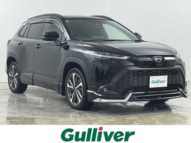 トヨタ カローラ クロス ハイブリッド Z 道央・札幌 2025(令7)年 0.8万km アティチュードブラックマイカ ・4WD/ムーンルーフ/モデリスタエアロ/・トヨタセーフティセンス/・レーダークルーズコントロール/・プリクラッシュセーフティ/・純正ディスプレイオーディオ　/・フルセグ/BT/USB/バックカメラ/・パワーバックドア/・ハーフレザーシート/D席パワーシート/・前席シートヒーター/・LEDオートライト/オートマチックハイビーム/・ETC2.0/ステアリングスイッチ/・スマートキー
