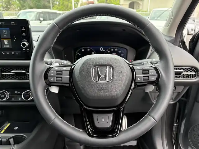 ホンダ ＺＲ－Ｖ ハイブリッド e:HEV Z 三重県 2024(令6)年 0.5万km スーパープラチナグレーメタリック マルチビューカメラシステム/ホンダコネクトディスプレー(9インチワイドディスプレイ/AppleCarPlay/AndroidAuto/Bluetooth/インターナビ/地デジTV/AM/FM/ハンズフリー機能/先読みエコアシスト)/ブラインドスポットモニター/ホンダセンシング(衝突軽減ブレーキ/誤発進抑制/後方誤発進抑制/近距離衝突軽減ブレーキ/歩行者事故低減ステアリング/路外逸脱抑制/渋滞追従機能付アダプティブクルーズコントロール/車線維持支援システム/トラフィックジャムアシスト/先行車発進お知らせ/標識認識/オートハイビーム/ブラインドスポットインフォメーション/パーキングセンサーシステム/後退出庫サポート)/ETC2.0/ドライブレコーダー/ステアリングヒーター/シートヒーター(前席)/ワイヤレス充電器/パワーバックドア/ステアリングスイッチ/パドルシフト/パワーシート(前席)/ドライビングポジションシステム(運転席)/LEDヘッドランプ/アクティブコーナーリングライト/ダウンサス(RSR(Ti2000))/スペアキー