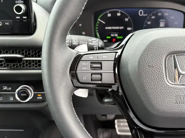 ホンダ ＺＲ－Ｖ ハイブリッド e:HEV Z 三重県 2024(令6)年 0.5万km スーパープラチナグレーメタリック マルチビューカメラシステム/ホンダコネクトディスプレー(9インチワイドディスプレイ/AppleCarPlay/AndroidAuto/Bluetooth/インターナビ/地デジTV/AM/FM/ハンズフリー機能/先読みエコアシスト)/ブラインドスポットモニター/ホンダセンシング(衝突軽減ブレーキ/誤発進抑制/後方誤発進抑制/近距離衝突軽減ブレーキ/歩行者事故低減ステアリング/路外逸脱抑制/渋滞追従機能付アダプティブクルーズコントロール/車線維持支援システム/トラフィックジャムアシスト/先行車発進お知らせ/標識認識/オートハイビーム/ブラインドスポットインフォメーション/パーキングセンサーシステム/後退出庫サポート)/ETC2.0/ドライブレコーダー/ステアリングヒーター/シートヒーター(前席)/ワイヤレス充電器/パワーバックドア/ステアリングスイッチ/パドルシフト/パワーシート(前席)/ドライビングポジションシステム(運転席)/LEDヘッドランプ/アクティブコーナーリングライト/ダウンサス(RSR(Ti2000))/スペアキー
