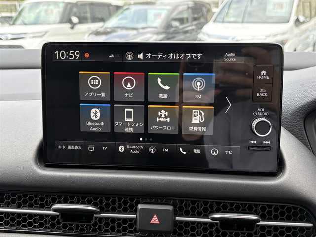 ホンダ ＺＲ－Ｖ ハイブリッド e:HEV Z 福岡県 2024(令6)年 0.5万km スーパープラチナグレーメタリック マルチビューカメラシステム/ホンダコネクトディスプレー(9インチワイドディスプレイ/AppleCarPlay/AndroidAuto/Bluetooth/インターナビ/地デジTV/AM/FM/ハンズフリー機能/先読みエコアシスト)/ブラインドスポットモニター/ホンダセンシング(衝突軽減ブレーキ/誤発進抑制/後方誤発進抑制/近距離衝突軽減ブレーキ/歩行者事故低減ステアリング/路外逸脱抑制/渋滞追従機能付アダプティブクルーズコントロール/車線維持支援システム/トラフィックジャムアシスト/先行車発進お知らせ/標識認識/オートハイビーム/ブラインドスポットインフォメーション/パーキングセンサーシステム/後退出庫サポート)/ETC2.0/ドライブレコーダー/ステアリングヒーター/シートヒーター(前席)/ワイヤレス充電器/パワーバックドア/ステアリングスイッチ/パドルシフト/パワーシート(前席)/ドライビングポジションシステム(運転席)/LEDヘッドランプ/アクティブコーナーリングライト/ダウンサス(RSR(Ti2000))/スペアキー