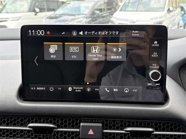 ホンダ ＺＲ－Ｖ ハイブリッド e:HEV Z 福岡県 2024(令6)年 0.5万km スーパープラチナグレーメタリック マルチビューカメラシステム/ホンダコネクトディスプレー(9インチワイドディスプレイ/AppleCarPlay/AndroidAuto/Bluetooth/インターナビ/地デジTV/AM/FM/ハンズフリー機能/先読みエコアシスト)/ブラインドスポットモニター/ホンダセンシング(衝突軽減ブレーキ/誤発進抑制/後方誤発進抑制/近距離衝突軽減ブレーキ/歩行者事故低減ステアリング/路外逸脱抑制/渋滞追従機能付アダプティブクルーズコントロール/車線維持支援システム/トラフィックジャムアシスト/先行車発進お知らせ/標識認識/オートハイビーム/ブラインドスポットインフォメーション/パーキングセンサーシステム/後退出庫サポート)/ETC2.0/ドライブレコーダー/ステアリングヒーター/シートヒーター(前席)/ワイヤレス充電器/パワーバックドア/ステアリングスイッチ/パドルシフト/パワーシート(前席)/ドライビングポジションシステム(運転席)/LEDヘッドランプ/アクティブコーナーリングライト/ダウンサス(RSR(Ti2000))/スペアキー