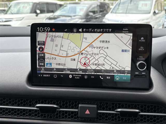ホンダ ＺＲ－Ｖ ハイブリッド e:HEV Z 福岡県 2024(令6)年 0.5万km スーパープラチナグレーメタリック マルチビューカメラシステム/ホンダコネクトディスプレー(9インチワイドディスプレイ/AppleCarPlay/AndroidAuto/Bluetooth/インターナビ/地デジTV/AM/FM/ハンズフリー機能/先読みエコアシスト)/ブラインドスポットモニター/ホンダセンシング(衝突軽減ブレーキ/誤発進抑制/後方誤発進抑制/近距離衝突軽減ブレーキ/歩行者事故低減ステアリング/路外逸脱抑制/渋滞追従機能付アダプティブクルーズコントロール/車線維持支援システム/トラフィックジャムアシスト/先行車発進お知らせ/標識認識/オートハイビーム/ブラインドスポットインフォメーション/パーキングセンサーシステム/後退出庫サポート)/ETC2.0/ドライブレコーダー/ステアリングヒーター/シートヒーター(前席)/ワイヤレス充電器/パワーバックドア/ステアリングスイッチ/パドルシフト/パワーシート(前席)/ドライビングポジションシステム(運転席)/LEDヘッドランプ/アクティブコーナーリングライト/ダウンサス(RSR(Ti2000))/スペアキー