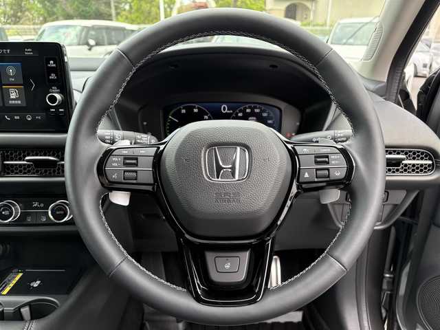 ホンダ ＺＲ－Ｖ ハイブリッド e:HEV Z 福岡県 2024(令6)年 0.5万km スーパープラチナグレーメタリック マルチビューカメラシステム/ホンダコネクトディスプレー(9インチワイドディスプレイ/AppleCarPlay/AndroidAuto/Bluetooth/インターナビ/地デジTV/AM/FM/ハンズフリー機能/先読みエコアシスト)/ブラインドスポットモニター/ホンダセンシング(衝突軽減ブレーキ/誤発進抑制/後方誤発進抑制/近距離衝突軽減ブレーキ/歩行者事故低減ステアリング/路外逸脱抑制/渋滞追従機能付アダプティブクルーズコントロール/車線維持支援システム/トラフィックジャムアシスト/先行車発進お知らせ/標識認識/オートハイビーム/ブラインドスポットインフォメーション/パーキングセンサーシステム/後退出庫サポート)/ETC2.0/ドライブレコーダー/ステアリングヒーター/シートヒーター(前席)/ワイヤレス充電器/パワーバックドア/ステアリングスイッチ/パドルシフト/パワーシート(前席)/ドライビングポジションシステム(運転席)/LEDヘッドランプ/アクティブコーナーリングライト/ダウンサス(RSR(Ti2000))/スペアキー