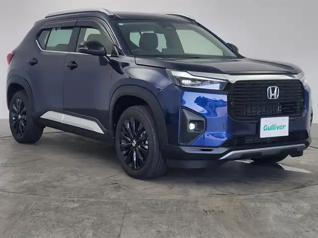 ホンダ ＷＲ－Ｖ Z+ ブラックスタイル 愛知県 2025(令7)年 0.1万km オブシダンブルーパール ホンダセンシング/　・衝突軽減ブレーキシステム/　・誤発進抑制機能/　・歩行者事故低減ステアリング/　・路外逸脱抑制機能/　・アダプティブクルーズコントロール/　・車線維持支援システム/　・オートハイビーム/　・パーキングセンサーシステム/純正8インチディスプレイオーディオ/（Bluetooth/AppleCarPlay/AndroidAute/USB/HDMI）/バックカメラ/パドルシフト/ステアリングスイッチ/ハーフレザー/ルーフレール/オートライト/ドアバイザー/純正AW/純正LEDライト/本革巻ステアリング