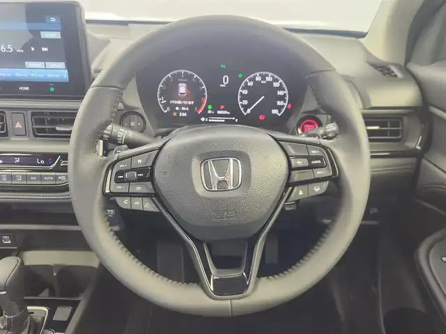 ホンダ ＷＲ－Ｖ Z+ ブラックスタイル 愛知県 2025(令7)年 0.1万km オブシダンブルーパール ホンダセンシング/　・衝突軽減ブレーキシステム/　・誤発進抑制機能/　・歩行者事故低減ステアリング/　・路外逸脱抑制機能/　・アダプティブクルーズコントロール/　・車線維持支援システム/　・オートハイビーム/　・パーキングセンサーシステム/純正8インチディスプレイオーディオ/（Bluetooth/AppleCarPlay/AndroidAute/USB/HDMI）/バックカメラ/パドルシフト/ステアリングスイッチ/ハーフレザー/ルーフレール/オートライト/ドアバイザー/純正AW/純正LEDライト/本革巻ステアリング