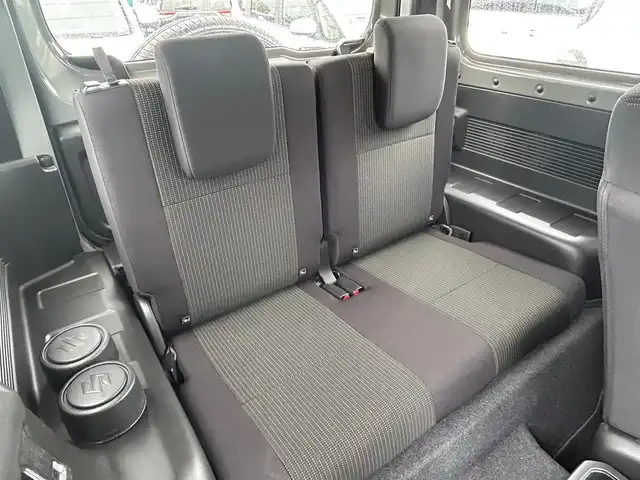 スズキ ジムニー XC 大阪府 2024(令6)年 1.5万km ミディアムグレー 社外ナビ　/　 ＴＶ/CD/DVD/Bluetooth　/バックモニター　/衝突軽減ブレーキ/リアコーナーセンサー　/前席シートヒーター　/スマートルームミラー/クルーズコントロール/レーンキープアシスト　/アイドリングストップ/前方ドライブレコーダー/純正フロアマット/純正16インチアルミホイール/ルーフレール/プッシュスタート　/スマートキー　/ＥＴＣ/ＬＥＤ