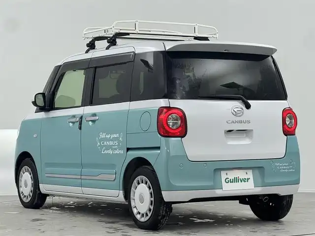 ダイハツ ムーヴ キャンバス ストライプス G 熊本県 2022(令4)年 2.5万km シャイニングホワイトパール/ファインミントメタリック 禁煙車/衝突被害軽減ブレーキ/純正9型ナビTV/（NMZN-Z72DS/CD/DVD/Bluetooth/フルセグTV)/純正バックカメラ/純正ドライブレコーダー/純正ルーフキャリア/純正LEDオートライト/純正LEDフォグ/純正ルーフエンドスポイラー/純正セキュリティアラーム/純正フロアマット/両側電動スライドドア/クリアランスソナー/エコアイドル/前席シートヒーター/オートエアコン/電子パーキング/オートホールド/オート電動格納ミラー/ETC/スマートキー/プッシュエンジンスタート/新車時保証書/取扱い説明書