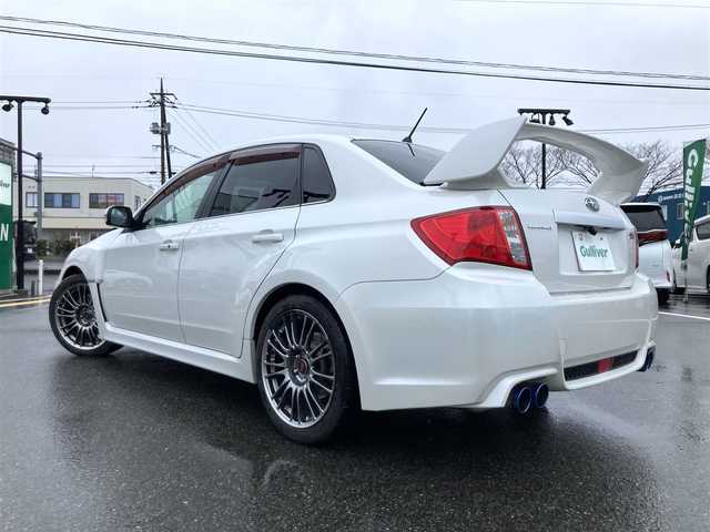 スバル インプレッサ ＷＲＸ STI A－Line 鳥取県 2011(平23)年 8.6万km サテンホワイトパール ４WD・ターボ車/社外ナビ/フルセグ/DVD/CD/BT/バックカメラ・ETC/プレミアムタンレザーパッケージ/前後ドライブレコーダー/純正オプションBBS製１８インチアルミ/大型トランクスポイラー/前席パワーシート/前席シートヒーター/クルーズコントロール/HKS4本出しマフラー/キセノンヘットライト/フォグライト/プッシュエンジンスタート