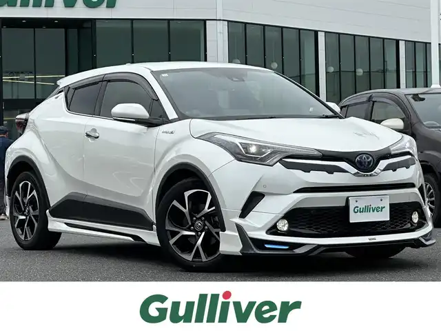 トヨタ Ｃ－ＨＲ G 島根県 2018(平30)年 5.1万km ホワイトパールクリスタルシャイン ワンオーナー/トヨタセーフティセンス/純正9インチナビ/CD/DVD/Bluetooth/フルセグTV/バックカメラ/モデリスタエアロ/クリアランスソナー/BSM/レーンディパーチャーアラート/ハーフレザー調シート/シートヒーター /LEDオートライト/オートマチックハイビーム/ビルトインETC/純正18インチアルミホイール/社外16インチAW付スタッドレス車載/スマートキー/スペアキー×1/プッシュスタート /純正フロアマット/取扱説明書/保証書