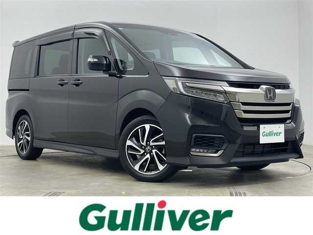 ホンダ ステップワゴン スパーダ クルスピセンシング 岡山県 2020(令2)年 3.5万km プレミアムスパークルブラックパール 純正９インチナビ/（Bluetooth/フルセグTV/CD/DVD/Carplay）/１１．６インチフリップダウンモニター/ハーフレザー/衝突軽減ブレーキシステム/レーダークルーズコントロール/ビルトインＥＴＣ２．０/ＬＥＤヘッドライト/フォグランプ/シートヒーター/純正ドライブレコーダー/両側電動スライドドア