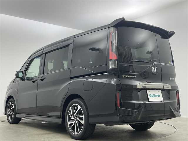 ホンダ ステップワゴン スパーダ クルスピセンシング 岡山県 2020(令2)年 3.5万km プレミアムスパークルブラックパール 純正９インチナビ/（Bluetooth/フルセグTV/CD/DVD/Carplay）/１１．６インチフリップダウンモニター/ハーフレザー/衝突軽減ブレーキシステム/レーダークルーズコントロール/ビルトインＥＴＣ２．０/ＬＥＤヘッドライト/フォグランプ/シートヒーター/純正ドライブレコーダー/両側電動スライドドア