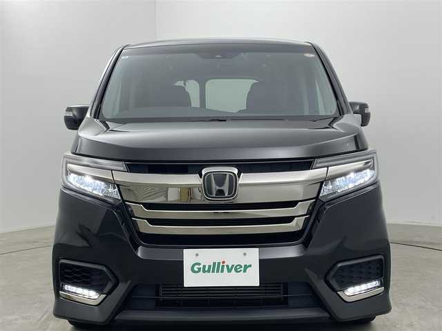 ホンダ ステップワゴン スパーダ クルスピセンシング 岡山県 2020(令2)年 3.5万km プレミアムスパークルブラックパール 純正９インチナビ/（Bluetooth/フルセグTV/CD/DVD/Carplay）/１１．６インチフリップダウンモニター/ハーフレザー/衝突軽減ブレーキシステム/レーダークルーズコントロール/ビルトインＥＴＣ２．０/ＬＥＤヘッドライト/フォグランプ/シートヒーター/純正ドライブレコーダー/両側電動スライドドア