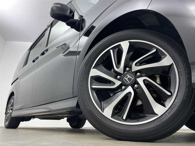 ホンダ ステップワゴン スパーダ クルスピセンシング 岡山県 2020(令2)年 3.5万km プレミアムスパークルブラックパール 純正９インチナビ/（Bluetooth/フルセグTV/CD/DVD/Carplay）/１１．６インチフリップダウンモニター/ハーフレザー/衝突軽減ブレーキシステム/レーダークルーズコントロール/ビルトインＥＴＣ２．０/ＬＥＤヘッドライト/フォグランプ/シートヒーター/純正ドライブレコーダー/両側電動スライドドア