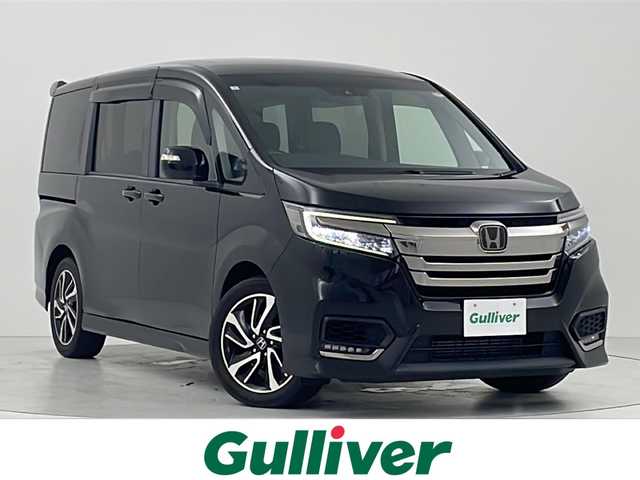 ホンダ ステップワゴン スパーダ クルスピセンシング 大阪府 2020(令2)年 3.5万km プレミアムスパークルブラックパール 純正９インチナビ/（Bluetooth/フルセグTV/CD/DVD/Carplay）/１１．６インチフリップダウンモニター/ハーフレザー/衝突軽減ブレーキシステム/レーダークルーズコントロール/ビルトインＥＴＣ２．０/ＬＥＤヘッドライト/フォグランプ/シートヒーター/純正ドライブレコーダー/両側電動スライドドア