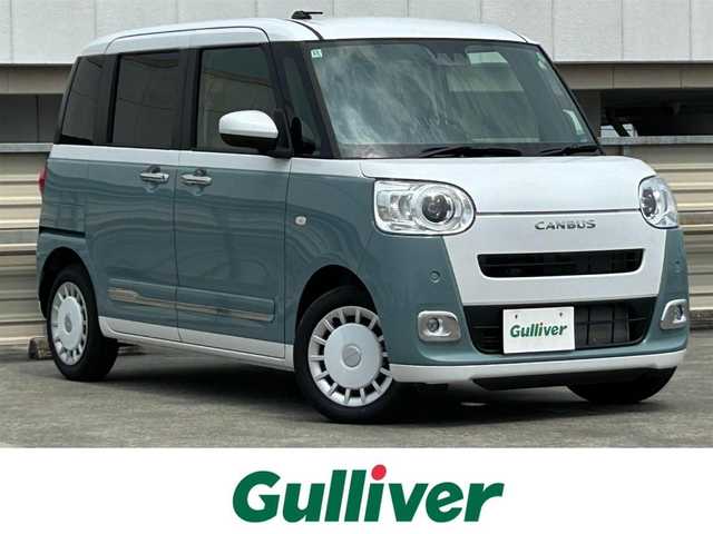 ダイハツ ムーヴ キャンバス ストライプス G 静岡県 2024(令6)年 0.2万km シャイニングホワイトパール/レイクブルーメタリック スマートアシスト/純正メモリーナビ/ＤＶＤ再生/フルセグＴＶ/ＢＴオーディオ/バックカメラ/シートヒーター/両側電動スライドドア/ＬＥＤヘッド/オートハイビーム/フォグライト/保温機能付きホットカップホルダー/純正フロアマット