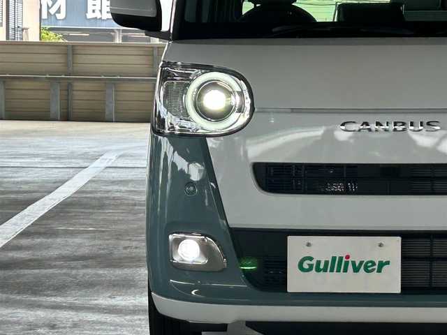 ダイハツ ムーヴ キャンバス ストライプス G 静岡県 2024(令6)年 0.2万km シャイニングホワイトパール/レイクブルーメタリック スマートアシスト/純正メモリーナビ/ＤＶＤ再生/フルセグＴＶ/ＢＴオーディオ/バックカメラ/シートヒーター/両側電動スライドドア/ＬＥＤヘッド/オートハイビーム/フォグライト/保温機能付きホットカップホルダー/純正フロアマット