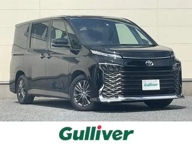 トヨタ ヴォクシー S－G 茨城県 2022(令4)年 2.1万km アティチュードブラックマイカ 純正メモリーナビ/　(TV/BT/CD/DVD)/フルセグ/バックカメラ/コーナーセンサー/両側パワースライドドア/クルーズコントロール/シートヒーター/純正フロアマット/純正アルミホイール/スペアキー１本/キャプテンアームレスト/LEDヘッドライト/快適便利パッケージ/ETC