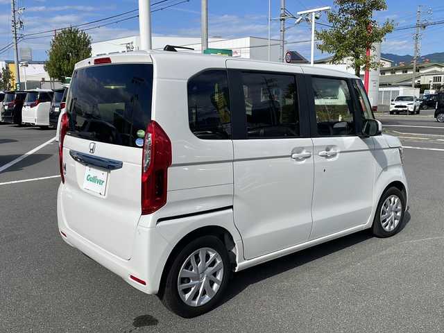 ホンダ Ｎ ＢＯＸ G L ホンダセンシング 長野県 2019(令1)年 1万km プラチナホワイトパール ホンダセンシング/・衝突軽減ブレーキ/・誤発進抑制機能/・アダプティブクルーズコントロール/・車線維持支援システム/・歩行者事故低減ステアリング/・路外逸脱抑制機能/・先行車発進お知らせ機能/・標識認識機能/純正7インチSDナビ【VXM-195VFi】/（CD/DVD/フルセグTV/BT）/バックカメラ/ビルトインETC/両側パワースライドドア/ステアリングスイッチ/LEDヘッドライト/フォグランプ/オートライト/スマートキー/Pスタート/電動格納ミラー/純正フロアマット