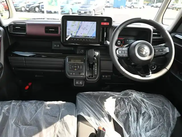 スズキ スペーシア カスタム HYBRID XS 千葉県 2025(令7)年 0.1千km ピュアホワイトパール/ブラック2トーン カスタム HV XS　全方位モニター付きメモリ-ナビゲーション・スズキコネクト対応通信機装着車(195800円)/スズキセーフティサポート/レーダークルーズコントロール/アイドリングストップ/両側パワースライドドア/ハーフレザーシート/前席シートヒーター/9インチ純正メモリーナビ/地デジTV/【Bluetooth接続】/全方位モニター/ヘッドアップディスプレイ/革巻きステアリング/ステアリングヒーター/ステアリングスイッチ/LEDヘッドライト/ウインカーミラー/純正15インチアルミホイル/サイド/カーテンエアバッグ/携帯リモコン