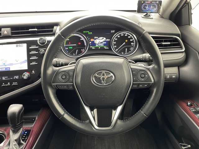 トヨタ カムリ WS 千葉県 2021(令3)年 2.9万km アティチュードブラックマイカ トヨタコネクトナビ/　CD/DVD/Bluetooth/フルセグTV/　Apple car play/Android Auto/トヨタセーフティセンス/レーダークルーズコントロール/レーンキープアシスト/衝突軽減ブレーキ/クリアランスソナー/ブラインドスポットモニター/先行車発進警報/ロードサインアシスト/電動パーキング/オートホールド/オートハイビーム/ハーフレザーシート/ビルトインETC２．０/後方ドラレコ/LEDライト/フォグランプ/パドルシフト/フロアマット/ドアバイザー