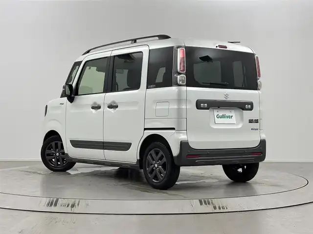 スズキ スペーシア ギア HYBRID XZターボ 埼玉県 2023(令5)年 3.1万km ピュアホワイトP ・セーフティサポート/・純正９インチナビゲーション/（フルセグTV/CD/DVD/Bluetooth/アップルカープレイ/アンドロイドオート）/・全方位カメラ/・クリアランスソナー /・レーダークルーズコントロール/・パドルシフト/・両側電動スライドドア/・運転席助手席シートヒーター /・ヘッドアップディスプレイ/・天井サーキュレーター/・後席ロールサンシェード/・運転席後テーブル/・オートLEDヘッドライト/・スマートキー/・プッシュスタート/・純正１４インチアルミホイール