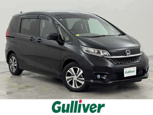 ホンダ フリード G ホンダセンシング 福岡県 2020(令2)年 2.9万km クリスタルブラックパール 純正９型ナビ（ＢＴ，フルセグＴＶ）　/バックカメラ　/ビルトインＥＴＣ　/前後ドラレコ　/アダプティブクルコン　/コーナーセンサー　/ホンダセンシング　/衝突被害軽減ブレーキ　/レーンキープ　/両側電動スライドドア