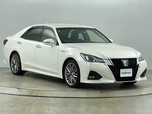 トヨタ クラウン ハイブリッド アスリートS 愛知県 2016(平28)年 11.8万km ホワイトパールクリスタルシャイン 禁煙車/純正8インチナビ/（CD/DVD/Bluetooth/フルセグTV）/バックカメラ/衝突軽減ブレーキ/レーダークルーズコントロール/パーキングセンサー/ETC/ドライブレコーダー/レーザーシート/パワーシート/シートヒーター/シートベンチレーション/ステアリングヒーター/純正１８インチアルミホイール/スマートキー/プッシュスタート/LEDヘッドライト/フロントフォグランプ/オートライト/純正フロアマット