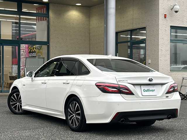 トヨタ クラウン ハイブリッド S Cパッケージ 愛知県 2019(平31)年 1.5万km ホワイトパールクリスタルシャイン 禁煙車/純正メモリナビ/　AM/FM/AUX/USB/DISC/BT/フルセグTV/バック・全周囲カメラ/前方ドライブレコーダー/TVキャンセラー/Toyata Safety Sense/クルーズコントロール（ACC）/レーンキープアシスト（LDA/LTA）/ブラインドスポットモニター（BSM）/オートマチックハイビーム（AHB）/プリクラッシュセーフティ（PCS）/前後クリアランスソナー（ICS）/横滑り防止装置/盗難防止装置/パーキングアシスト/電子パーキング/前席パワーシート/前席シートヒーター/ステアリングヒーター/ビルトインETC/革巻きステアリング/LEDヘッドライト/フォグランプ/オートライト/USB端子/純正17インチAW/純正フロアマット/純正ドアバイザー/W＋サイドエアバッグ/保証書/取説/スペアキー