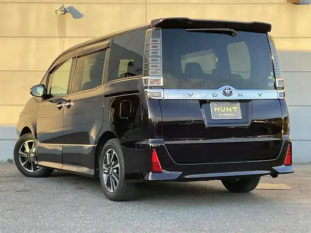 トヨタ ヴォクシー ZS 煌 千葉県 2018(平30)年 5万km ボルドーマイカメタリック 純正9インチディーラーナビ/後席フリップダウンモニター12．1インチ/フルセグTV/Bluetooth/DVD再生機能/バックカメラ/両側パワースライドドア/ETC/トヨタセーフティセンス/レーンキープアシスト/クルーズコントロール/LEDヘッドライト/オートハイビーム/ウィンカーミラー/デジタルインナーミラー/スマートキー/プッシュスタート/バイザー