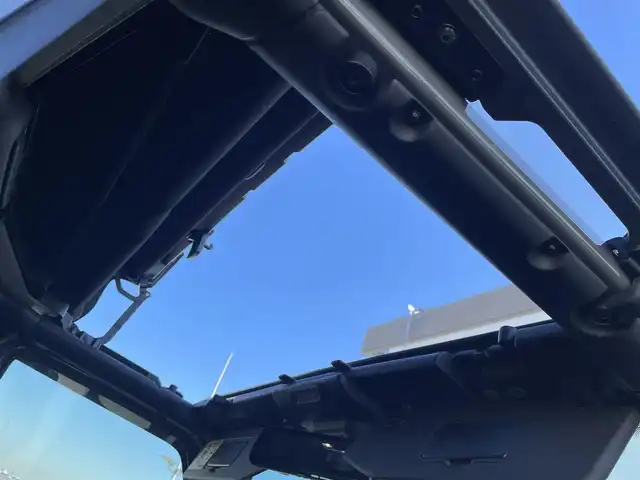 クライスラー・ジープ ジープ ラングラー LTD ED withサンライダー フリップT for HT 東京都 2022(令4)年 2.5万km グレー 純正ナビ/フルセグTV/バックカメラ/シートヒーター/ETC2.0/前後ドライブレコーダー（デジタルインナーミラー付き）/サンライダーフリップトップ/ステアリングヒーター/純正18インチアルミホイール/社外ステアリングダンパー/社外ボンネットキャッチ/牽引フック