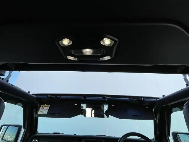 クライスラー・ジープ ジープ ラングラー LTD ED withサンライダー フリップT for HT 東京都 2022(令4)年 2.5万km グレー 純正ナビ/フルセグTV/バックカメラ/シートヒーター/ETC2.0/前後ドライブレコーダー（デジタルインナーミラー付き）/サンライダーフリップトップ/ステアリングヒーター/純正18インチアルミホイール/社外ステアリングダンパー/社外ボンネットキャッチ/牽引フック