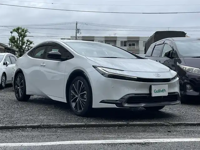 トヨタ プリウス Z 東京都 2024(令6)年 0.2万km プラチナホワイトパールマイカ 登録時走行距離1311km/ワンオーナー/純正メモリナビ/（フルセグTV/Bluetooth/USB）/Miracast/全周囲カメラ/デジタルインナーミラー/ナビ連動全方ドライブレコーダー/ビルトインETC2.0/置くだけ充電/パワーバックドア/D席パワーシート/メモリシート/前席シートヒーター/エアシート/TOYOTA Safety Sense/・レーダークルーズ コントロール/・プリクラッシュセーフティ/・レーントレーシングアシスト/・レーンディパーチャーアラート/・ロードサインアシスト/・先行車発進告知機能/・オートマチックハイビーム/純正19インチアルミホイール/純正LEDヘッドライト/スマートキー/スペアキー1本/保証書/取扱説明書