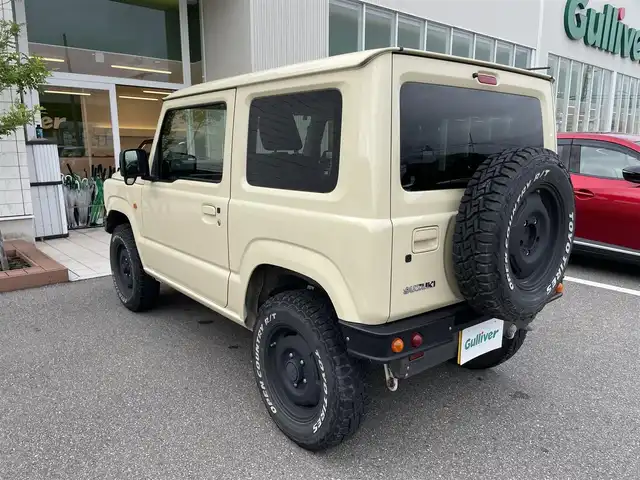スズキ ジムニー XL 石川県 2021(令3)年 4.9万km シフォンアイボリーM 4WD/社外メモリーナビ/社外CD/DVD再生/フルセグTV/ETC/社外バンパー/オープンカントリータイヤ/セーフティサポート/スマートキー/プッシュスタート/電動ミラー/社外グリル/保証書