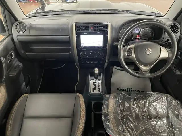 スズキ ジムニー ランドベンチャー 道央・札幌 2015(平27)年 3.2万km ブルーイッシュブラックパール3 4WD/社外SDナビ/・フルセグTV/CD/DVD/BT/SD/グレード専用合皮シート/運転席シートヒーター/ETC/ウインカーミラー/純正フロアマット/純正ドアバイザー/リモコンキー/スペアキー/フォグライト/背面タイヤ/KEELER製16インチAW/ヘッドライトレベライザー/新車時保証書/取扱説明書