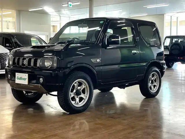 スズキ ジムニー ランドベンチャー 道央・札幌 2015(平27)年 3.2万km ブルーイッシュブラックパール3 4WD/社外SDナビ/・フルセグTV/CD/DVD/BT/SD/グレード専用合皮シート/運転席シートヒーター/ETC/ウインカーミラー/純正フロアマット/純正ドアバイザー/リモコンキー/スペアキー/フォグライト/背面タイヤ/KEELER製16インチAW/ヘッドライトレベライザー/新車時保証書/取扱説明書