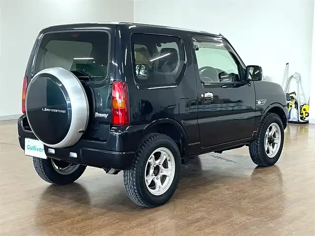スズキ ジムニー ランドベンチャー 道央・札幌 2015(平27)年 3.2万km ブルーイッシュブラックパール3 4WD/社外SDナビ/・フルセグTV/CD/DVD/BT/SD/グレード専用合皮シート/運転席シートヒーター/ETC/ウインカーミラー/純正フロアマット/純正ドアバイザー/リモコンキー/スペアキー/フォグライト/背面タイヤ/KEELER製16インチAW/ヘッドライトレベライザー/新車時保証書/取扱説明書