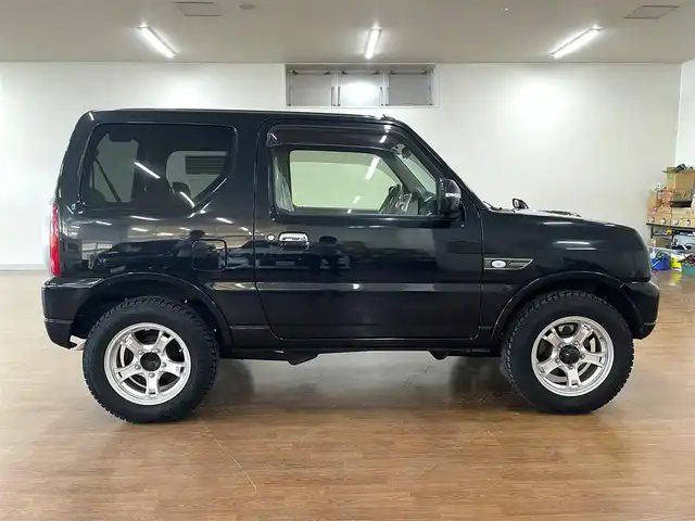 スズキ ジムニー ランドベンチャー 道央・札幌 2015(平27)年 3.2万km ブルーイッシュブラックパール3 4WD/社外SDナビ/・フルセグTV/CD/DVD/BT/SD/グレード専用合皮シート/運転席シートヒーター/ETC/ウインカーミラー/純正フロアマット/純正ドアバイザー/リモコンキー/スペアキー/フォグライト/背面タイヤ/KEELER製16インチAW/ヘッドライトレベライザー/新車時保証書/取扱説明書